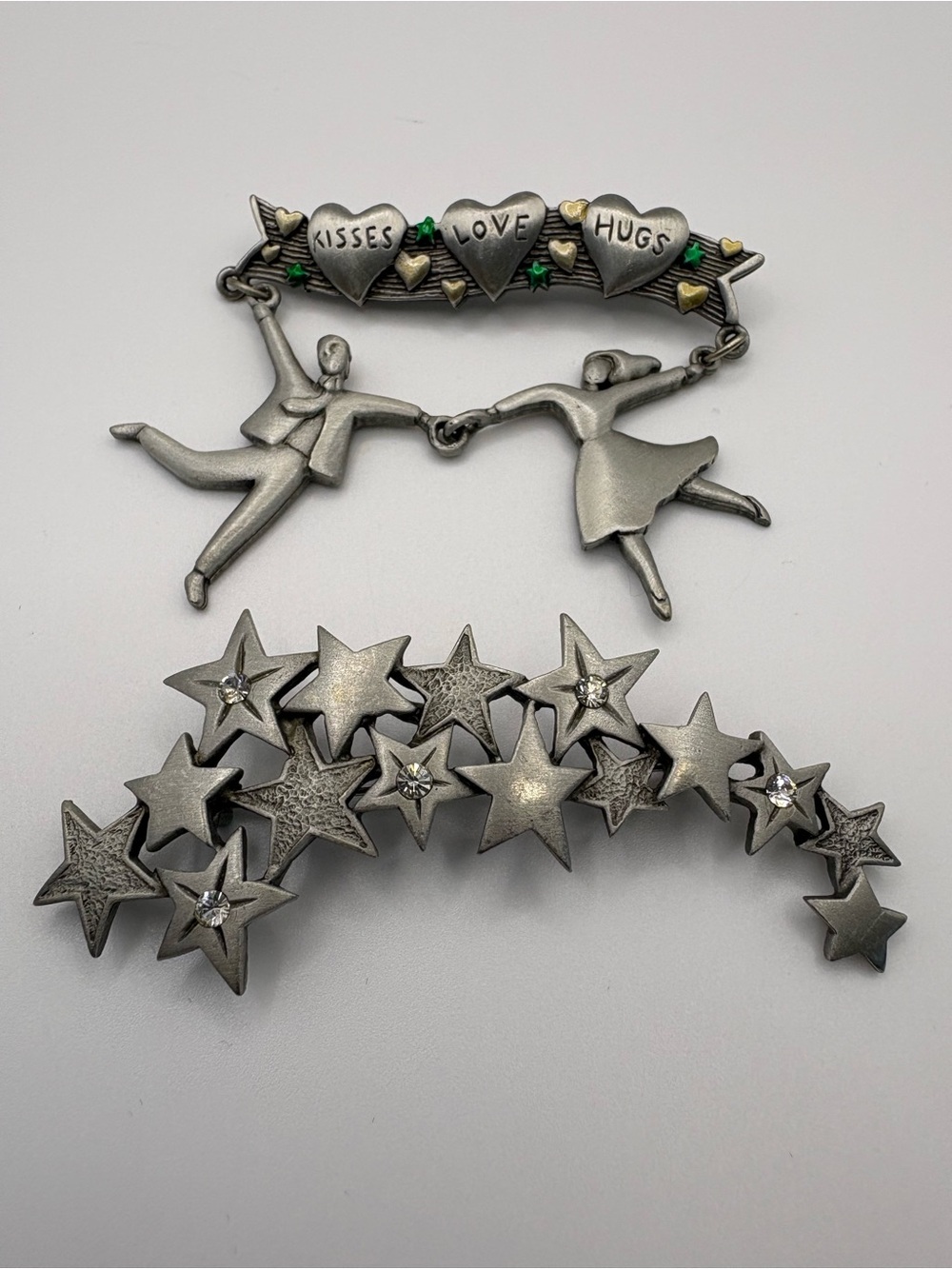 (210)J.J Pewter Kisses Love Hugs' and Star Motif Brooch Set